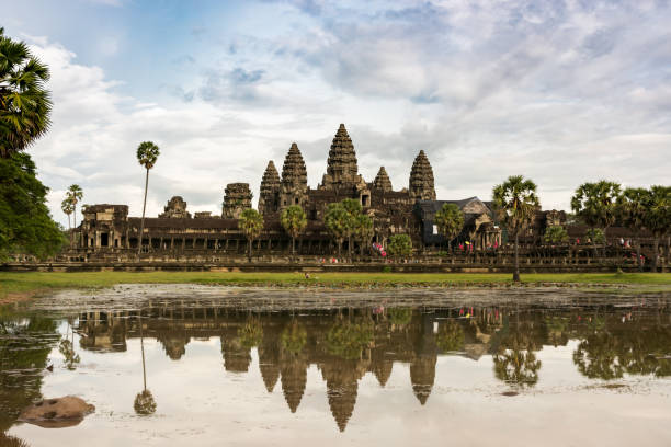 istock Reflection of beautiful Angkor Wat complex in Cambodia 932420292