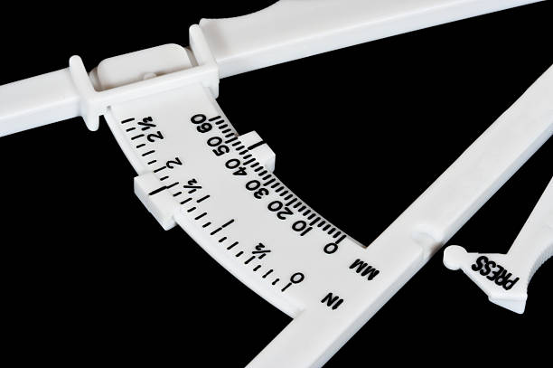 Body Fat Calipers Stock Photo - Download Image Now - Caliper, Overweight,  Black Background - iStock
