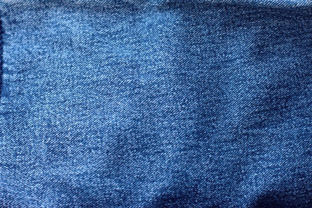 istock Denim jeans texture , background for design. Fiber and fabric structure 932424952