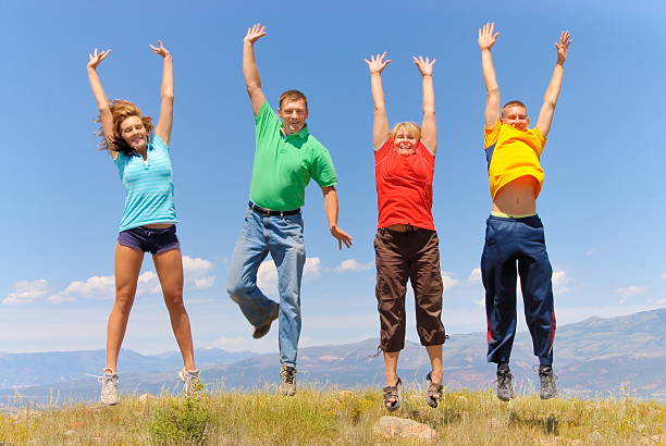 Family jump stock photo