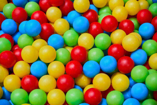 istock Colorful Rainbow dragee balls background. Photo Pattern design for banner, poster, flyer, card, postcard, cover 932433568