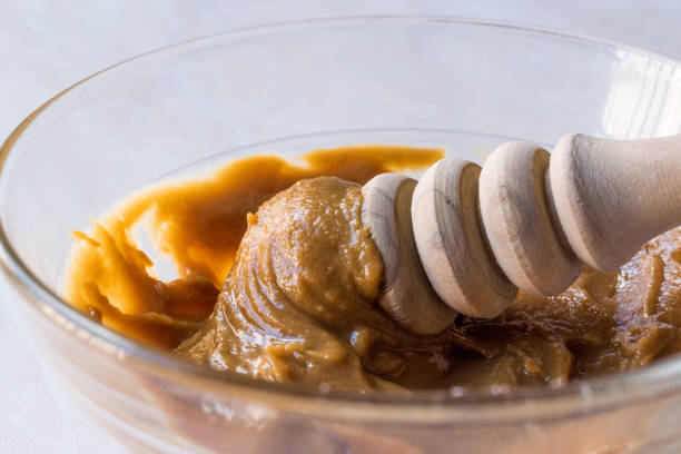 istock Whipped Honey Cream with Honey Dipper. 932436838