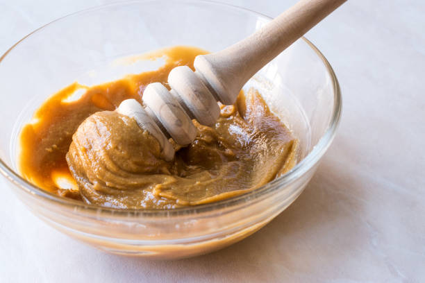 istock Whipped Honey Cream with Honey Dipper. 932436926
