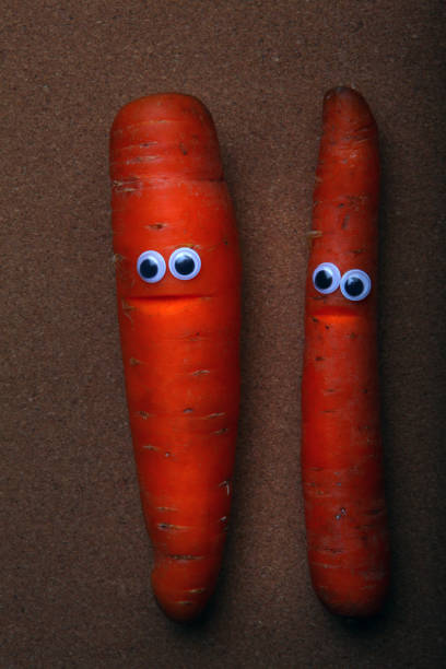 istock Carrot Studio quality wooden background 932439588