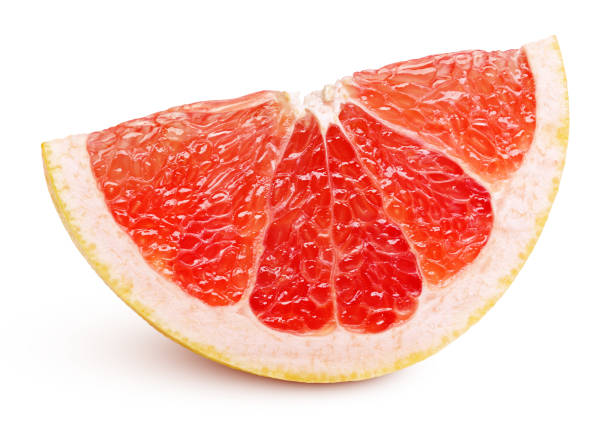 白で隔離ピンク グレープ フルーツの柑橘系の果物のくさび - citrus fruit portion grapefruit fruit ストックフォトと画像