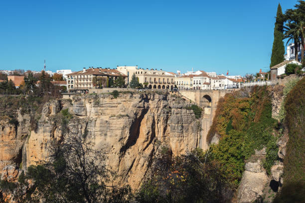 istock Architecture of Ronda town, located on high cliffs 932445706