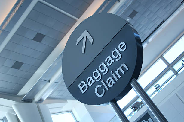 airport baggage sign stock photo