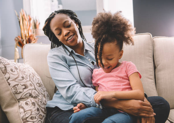 istock family fun on the couch 932451840