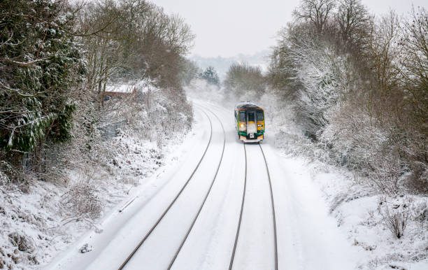 Train Cutting Through The Snow In The UK