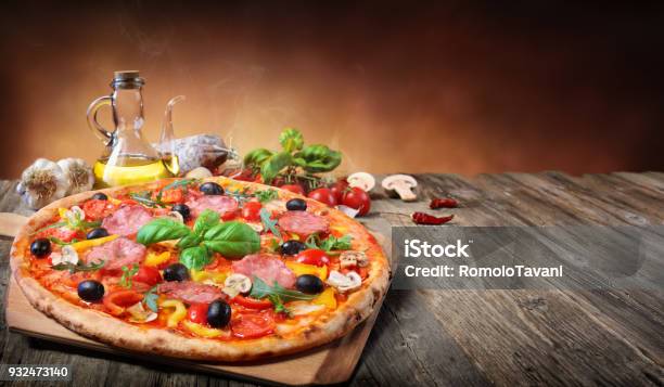 Hot Pizza Served On Old Table Stock Photo - Download Image Now - Pizza, Backgrounds, Italy