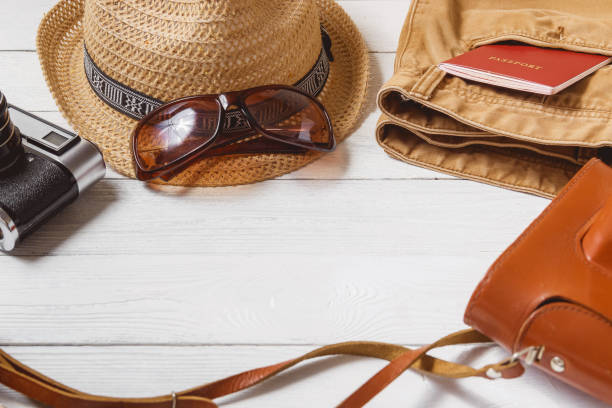 istock Traveler Items Vacation Accessories Holiday Long Weekend Travelling Stuff Equipment Background Concept with Copyspace 932477832