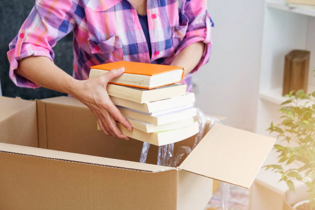 istock Senior woman moving into a new apartment 932478138