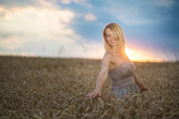 Asian girl on wheat field