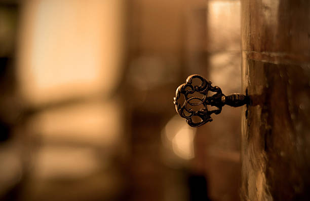 Old Key  antique key stock pictures, royalty-free photos & images