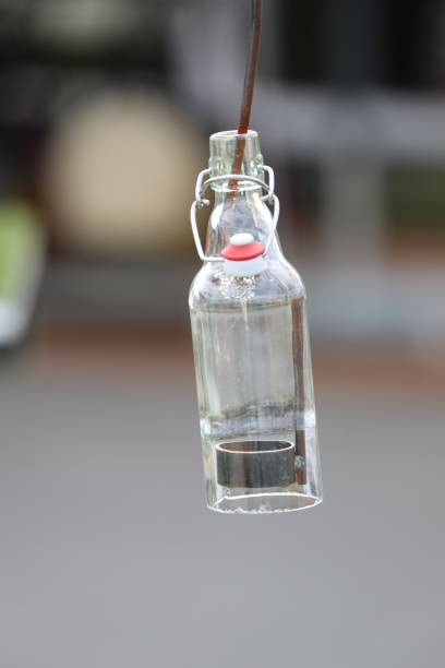 istock Close-Up Of Hanging Bottle Decoration 932483378