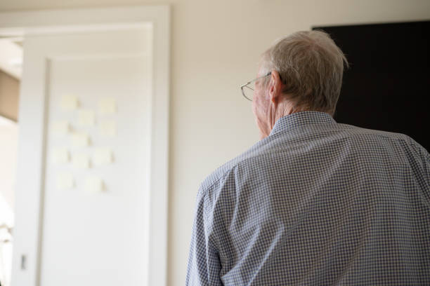 istock Portrait of distressed elderly man back 932507288