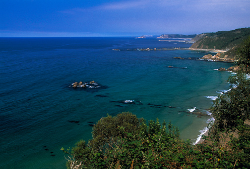 High angle view of cliffs and coastline, Asturias, Spain