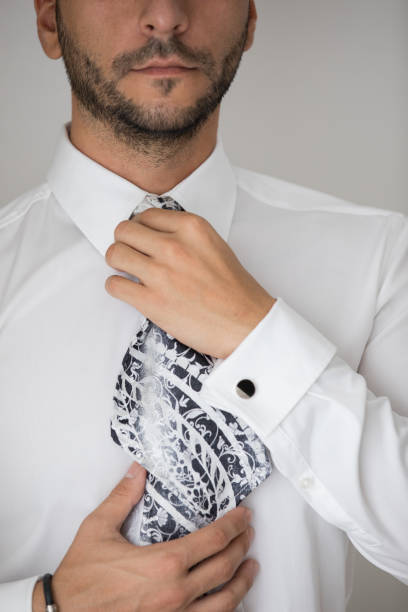 istock Young handsome groom preparing for wedding 932539360