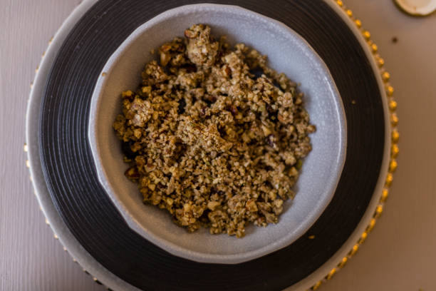 istock Healthy breakfast: whole grain cereal with some fruits over the table 932544864