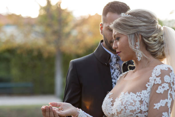 istock Wedding couple in nature 932546290