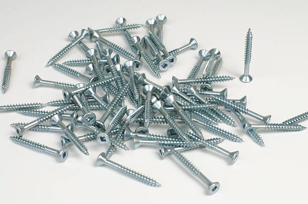 istock Many Metal Screws in a Pile 93254760