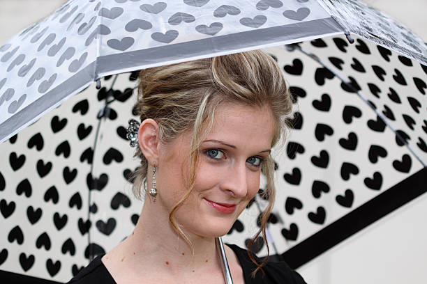 Young woman with umbrella stock photo