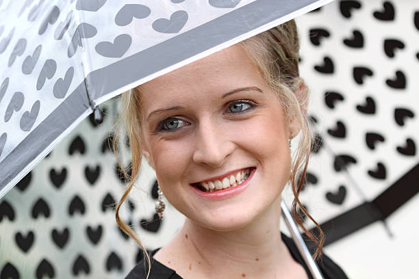 Young woman with umbrella stock photo