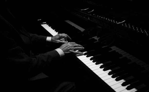 Hands playing the piano Hands playing the piano pianist stock pictures, royalty-free photos & images