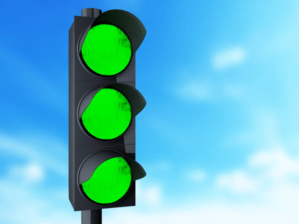 istock 3d Traffic light with green color. 932552188