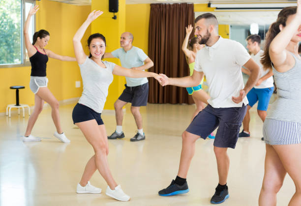 istock Young men and women dancing swing 932552638