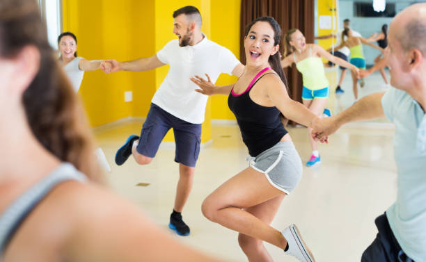 istock Young men and women dancing swing 932552648
