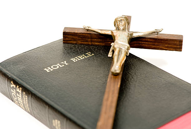 istock Holy Bible and Cross 93255419