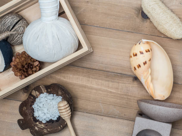 istock Aromatherapy  product  Spa set massage with white  wood background. top view,flat lay composition. 932556200