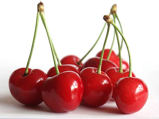 istock Red cherries with green steams on a white background 93256968