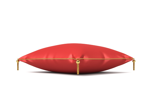 3d rendering of a red silk royal pillow with golden tussels isolated on a white background. Home decor. Royal wealth. Leaning on pillow.