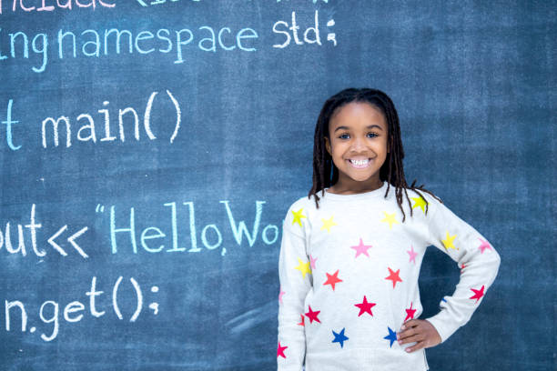 Beautiful Female Writing Code 530+ Girl Writing Code fotos de stock, imagens e fotos royalty-free ...