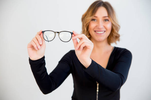 istock young woman in glasses 932590192
