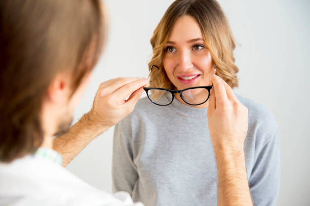 istock young woman in glasses 932590214