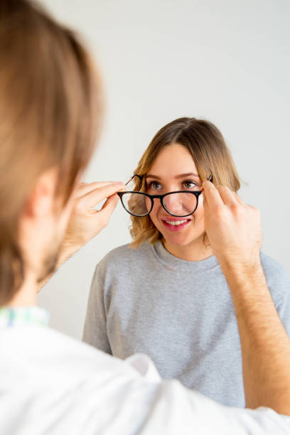 istock young woman in glasses 932590226