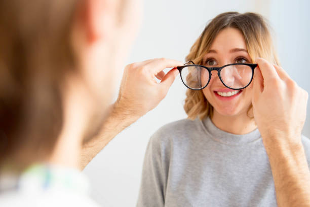 istock young woman in glasses 932590238