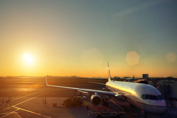 istock Airport terminal at sunset 932593426