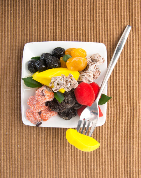 istock preserved fruits on background. 932598398