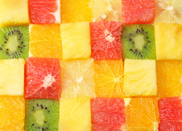 istock healthy citrus fruit salad background. top view 932608618