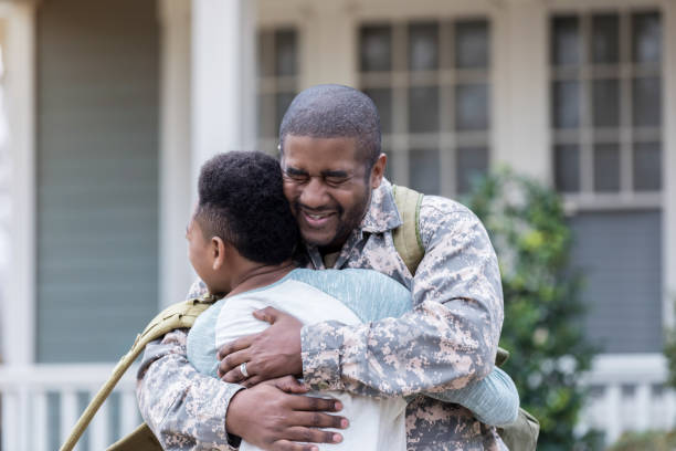 istock Upset military dad leaves son for overseas deployment 932608634