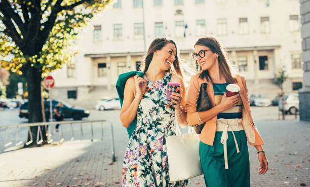 istock Friends drinking coffee in the city 932613098