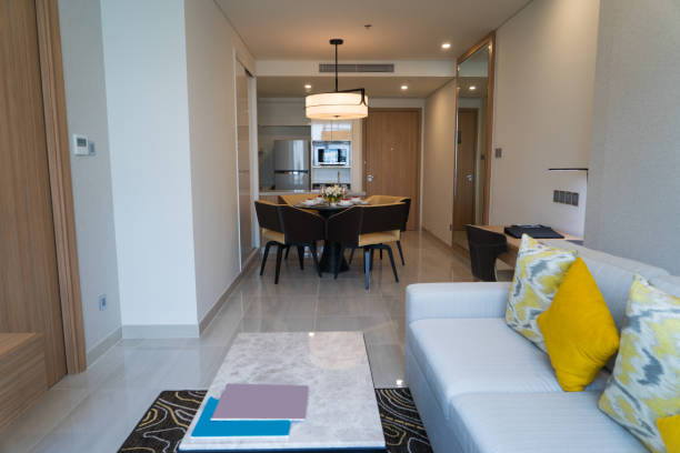 istock Narrow studio apartment with fashioned furniture 932613188