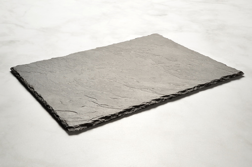 Black Stone Plate on Marble Table