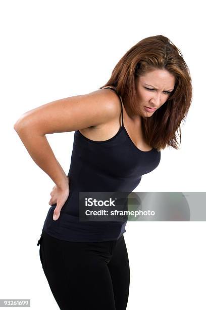 A Woman Suffering From Back Pain Stock Photo - Download Image Now - Pain, Sciatic Nerve, Backache