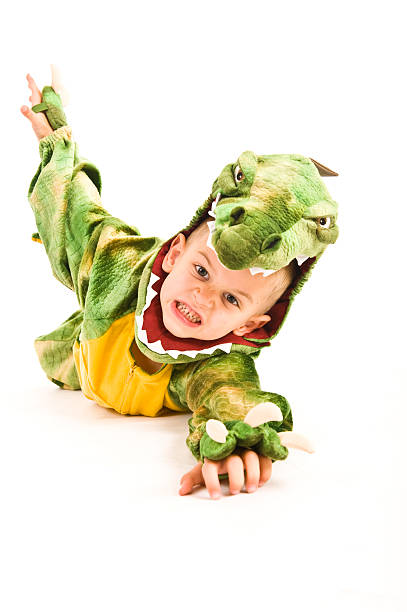 istock Adorable kid in Halloween crocodile costume 93262837
