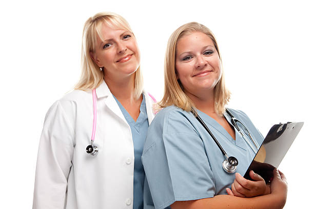 istock Friendly Female Blonde Doctors with Clip Board 93262992